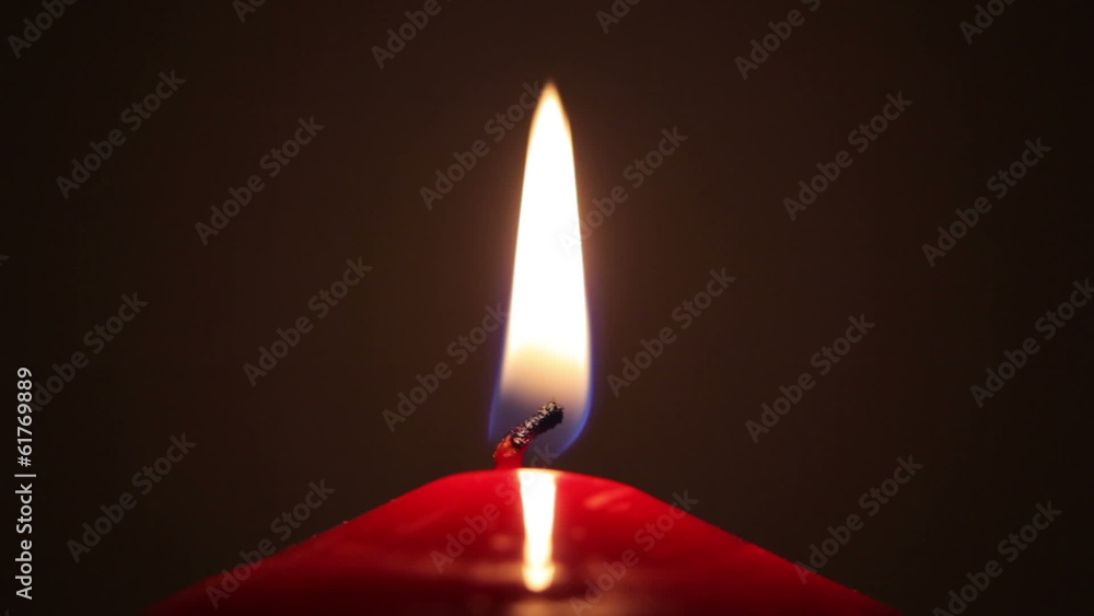 Close-up view of igniting and blown out red candle, HD, 1080p Close-up view of igniting and blown out red candle, HD, 1080p