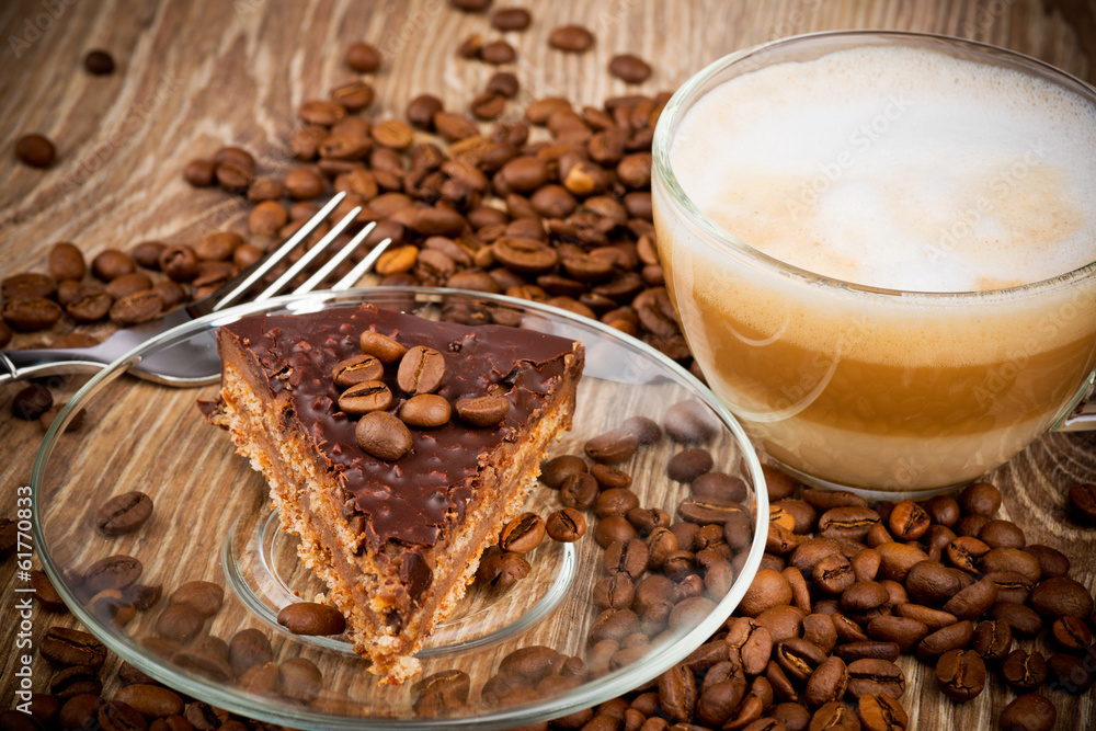 Cup of coffee latte and a cake Cup of coffee latte and a cake