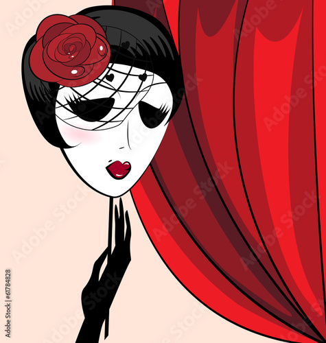 hand and mask of black-haired lady