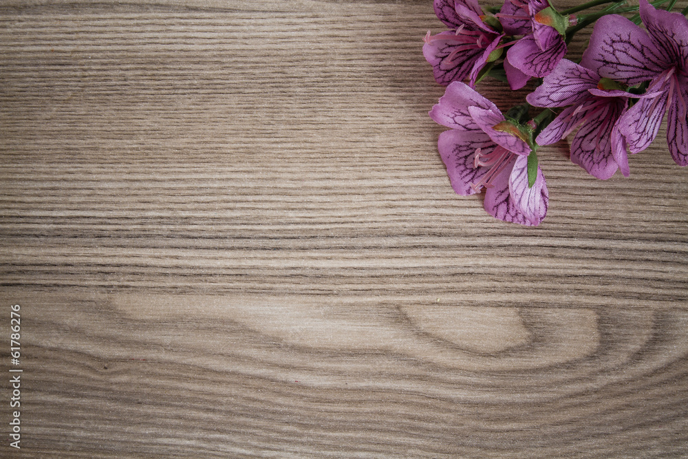 Articial Flowers on Wooden Desk