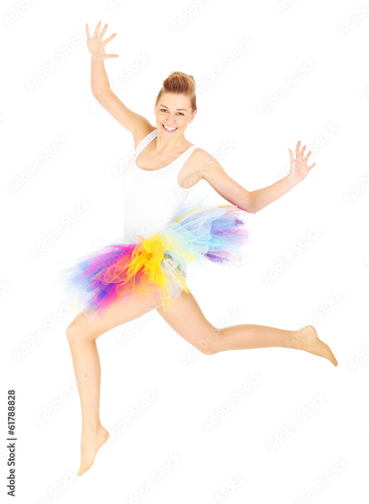 Jumping woman in a colourful skirt Jumping woman in a colourful skirt