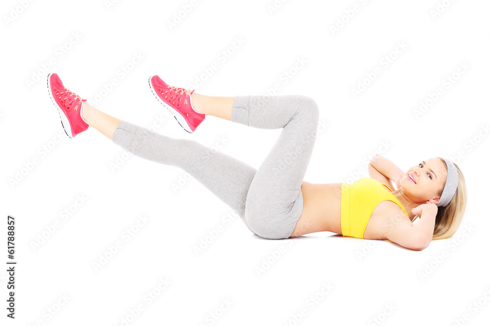 Woman doing sit-ups Woman doing sit-ups