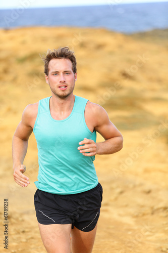 Runner man running outdoors in nature