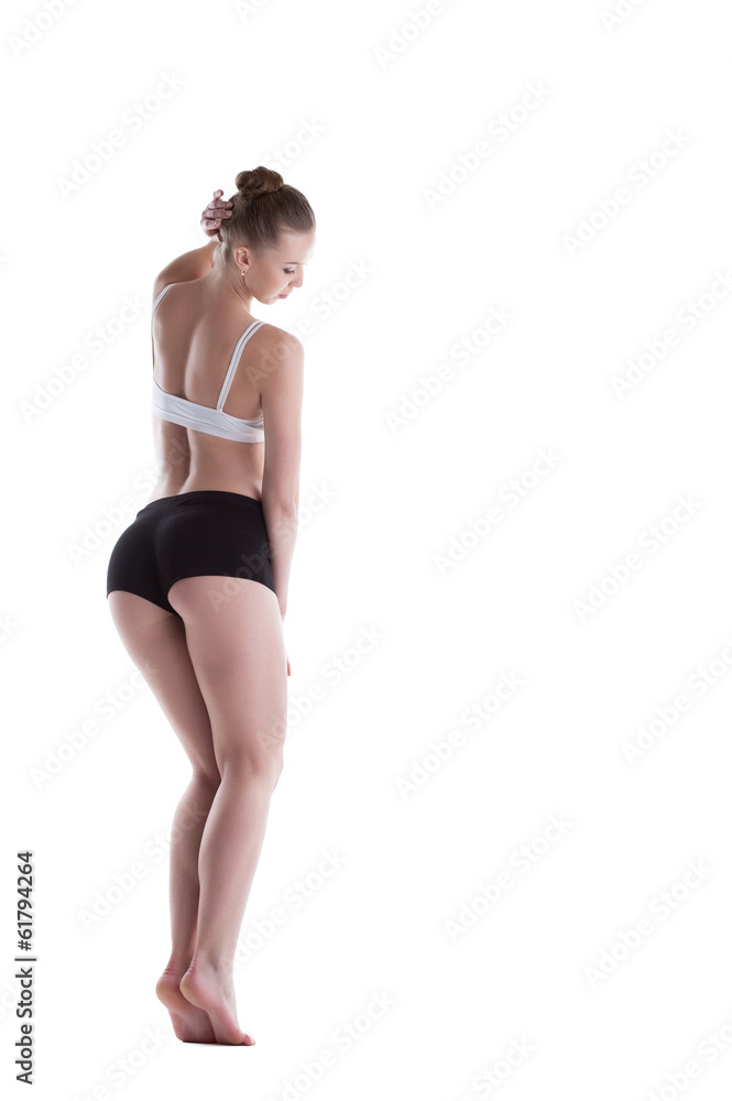 Sporty model with elastic skin posing in studio Sporty model with elastic skin posing in studio