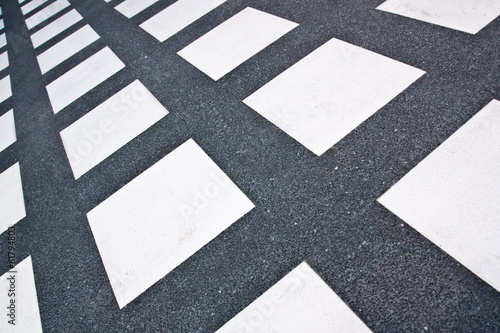 White square format floor tiles,shooting angle in obliquely.