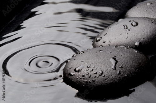 Canvas Print zen stones on wet background