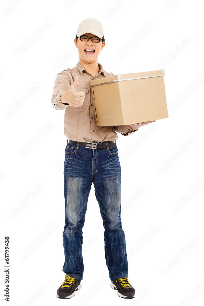 smiling delivery man holding parcel and thumb up smiling delivery man holding parcel and thumb up