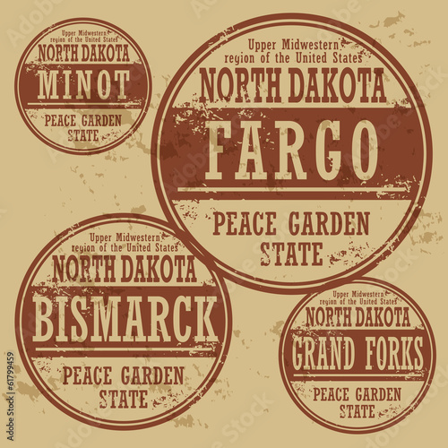 Grunge rubber stamp set with names of North Dakota cities