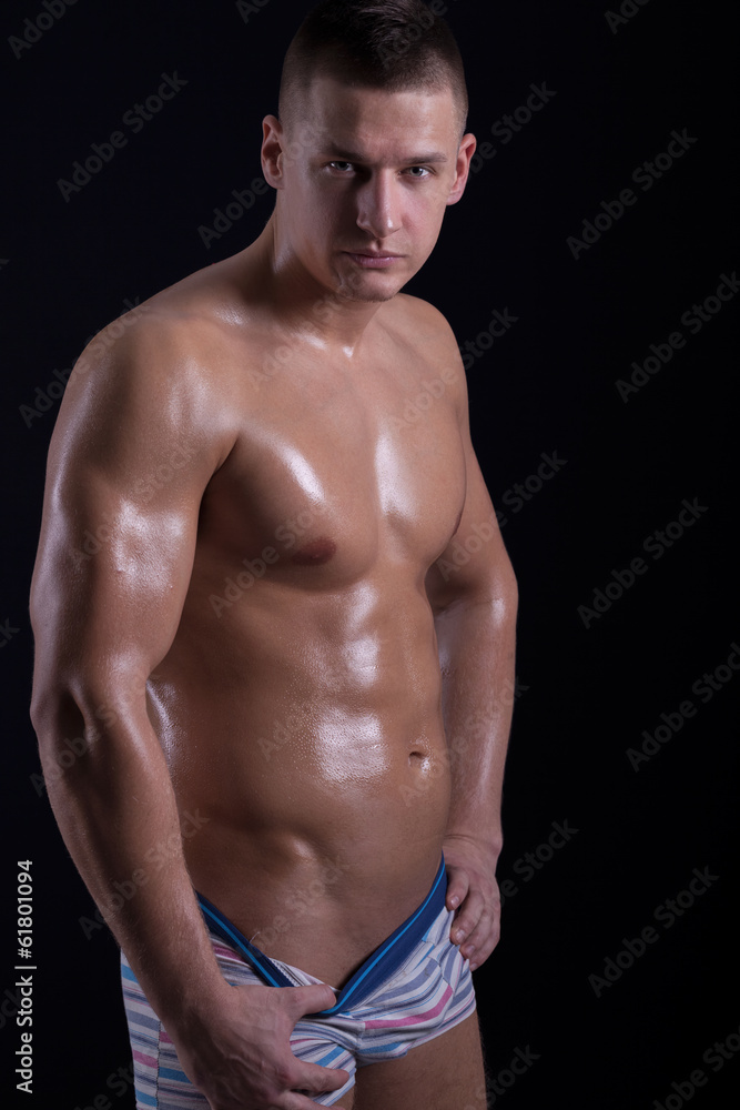 Portrait of fashion young caucasian sexy muscled attractive hand
