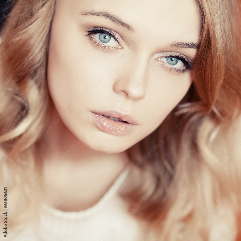 Obraz premium photograph of a beautiful young woman with a sexy look