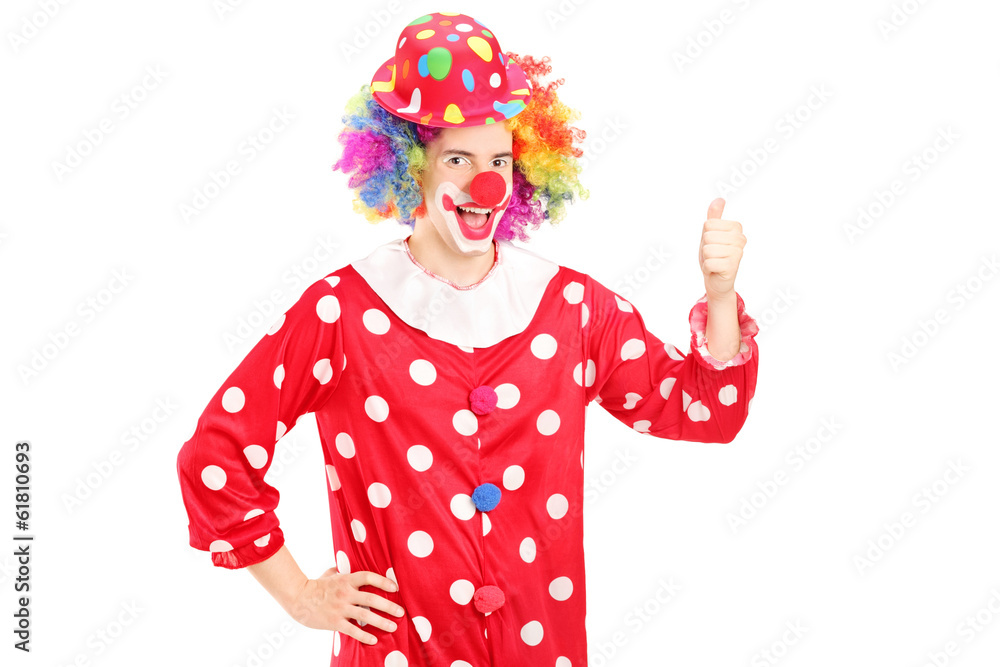 Smiling happy clown in red costume giving thumb up Smiling happy clown in red costume giving thumb up