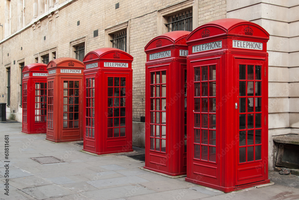 Traditional red telephone boxes in London, UK Traditional red telephone boxes in London, UK