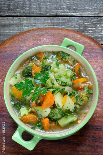 Vegetable soup with cabbage, broccoli, potatoes and carrots