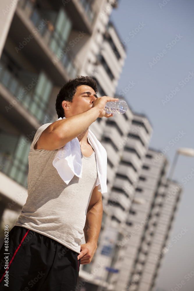 Fototapeta premium Tired athlete refreshing