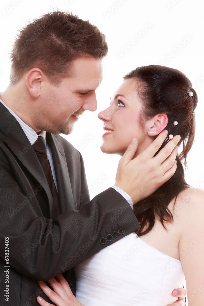 Portrait of happy bride and groom on white background Portrait of happy bride and groom on white background