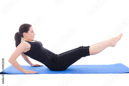 sporty woman doing strength exercises for abdominal muscles isol