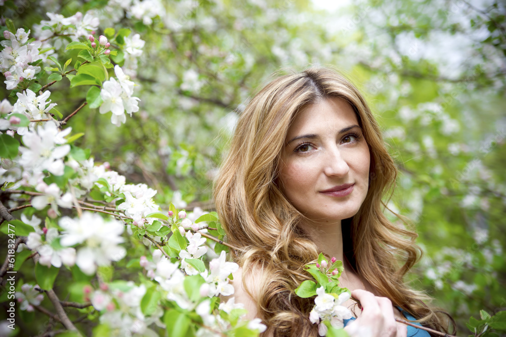 Beautiful woman in garden. Beautiful woman in garden.