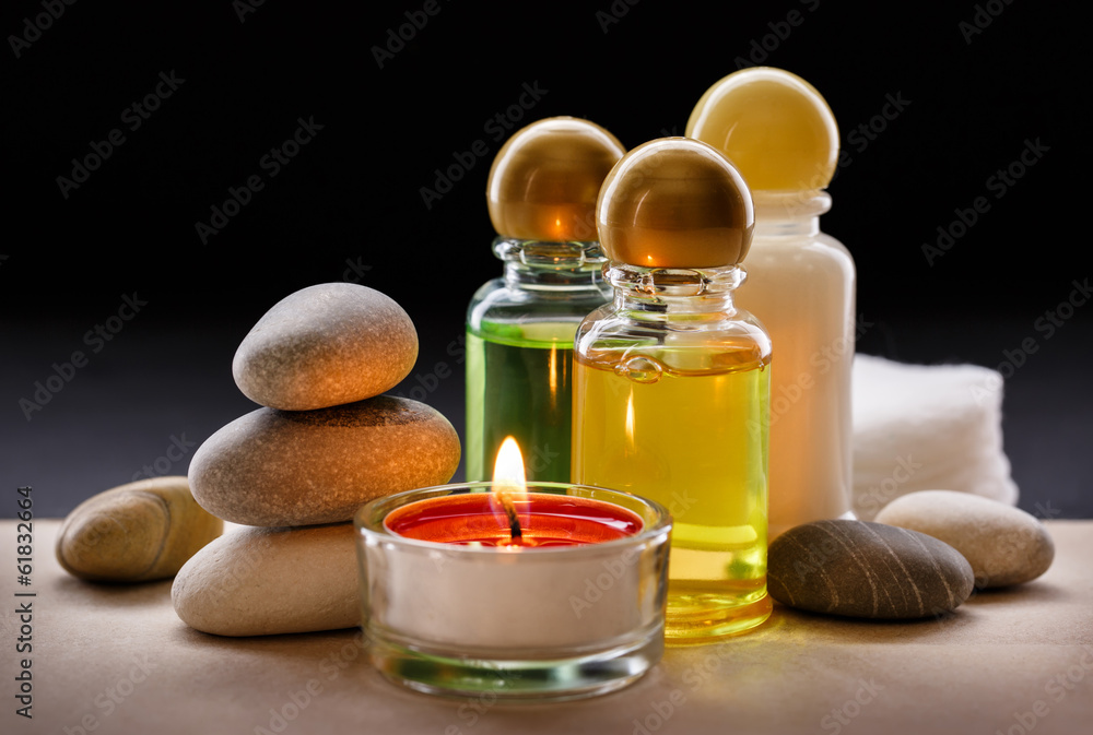 Spa stones, candle and shampoo Spa stones, candle and shampoo