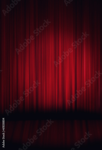 Spotlight on red stage curtain