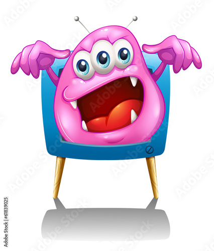 A television with a pink monster