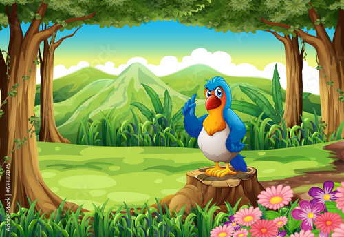 A colorful parrot above the stump of a tree