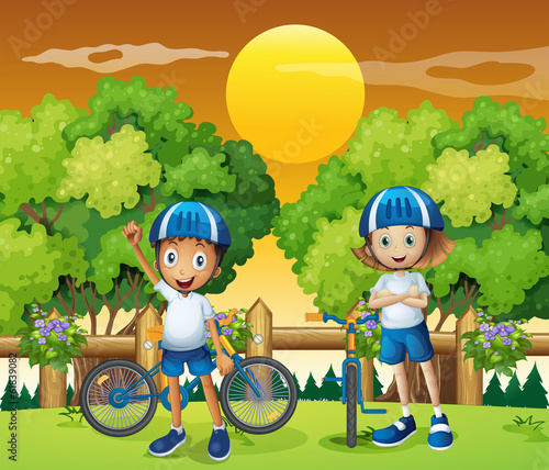 Two adorable kids biking