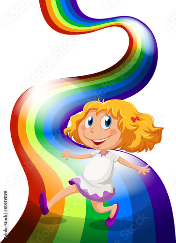 A young girl playing at the rainbow