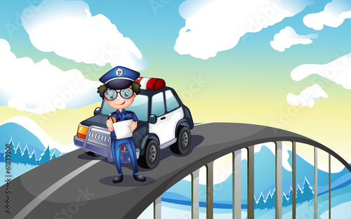 An officer and his patrol car in the middle of the road