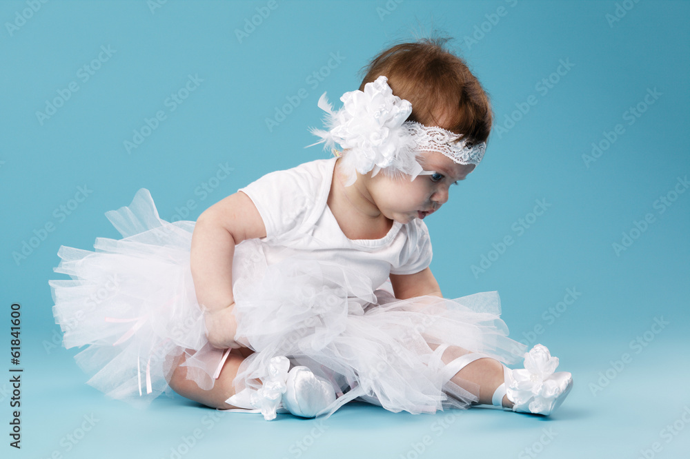 cute little ballerina on blue background cute little ballerina on blue background