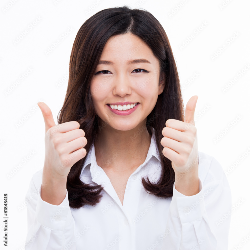 Young Asian woman showing thumb close up shot Young Asian woman showing thumb close up shot