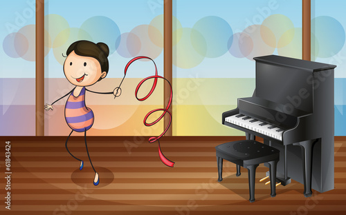 A gymnast inside the music room
