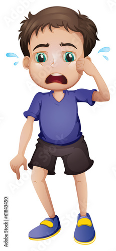 A young boy crying