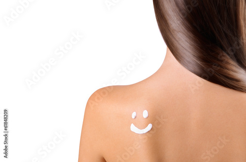 suntan cream smiley on shoulder