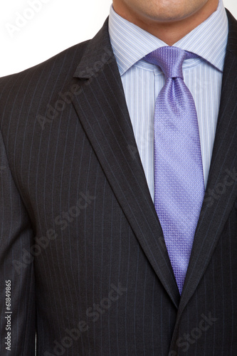 black suit with blue tie