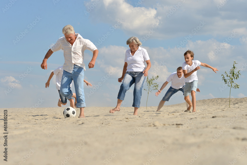 Family playing football Family playing football