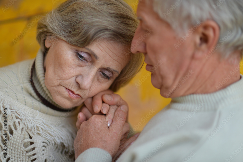 Close-up portrait of a sad elder couple Close-up portrait of a sad elder couple