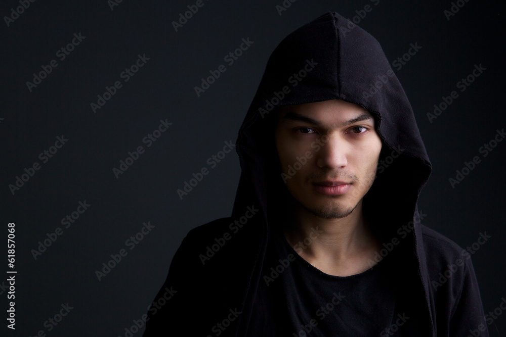 Male fashion model on black background Male fashion model on black background