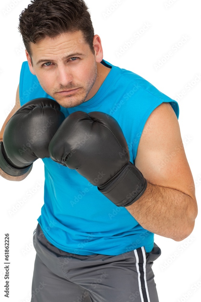 Determined male boxer focused on his training Determined male boxer focused on his training