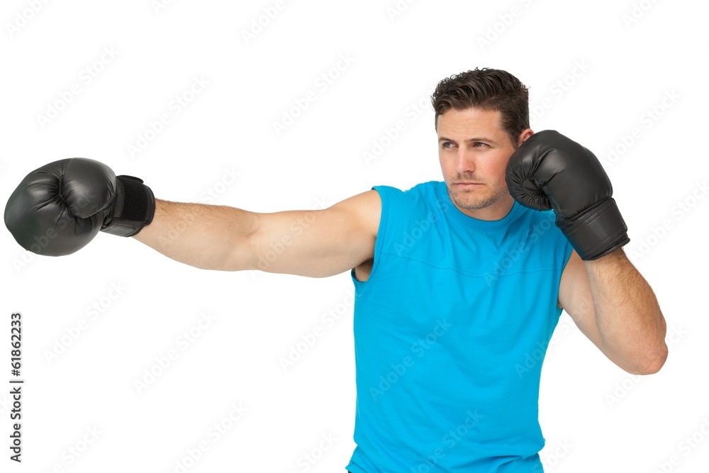 Determined male boxer focused on his training Determined male boxer focused on his training