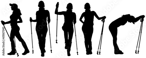 Vector silhouettes of people with trekking stick.