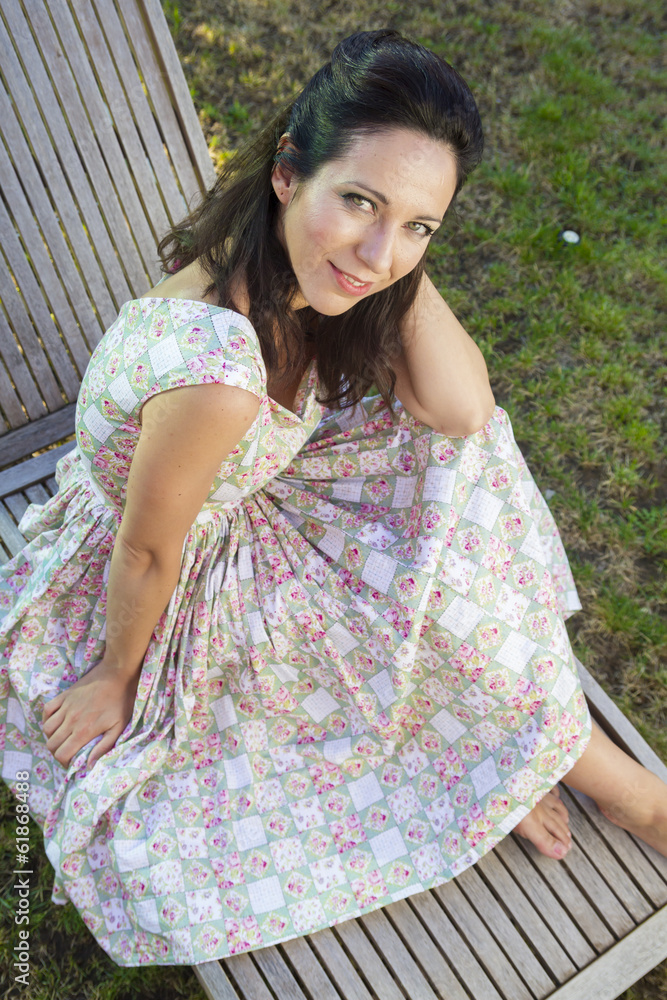 Naklejka premium Woman gardening. Mature girl gardening in her backyard. spring s