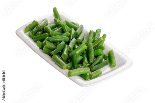 Fried green beans on a white plate