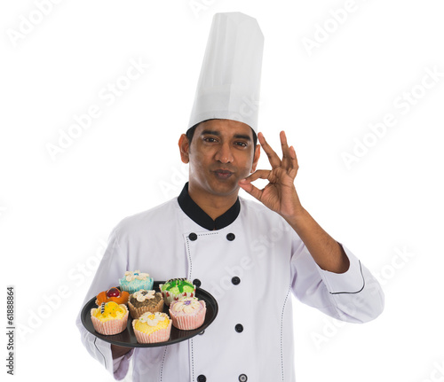 Fotografie indian male chef with tasty ok sign and white background