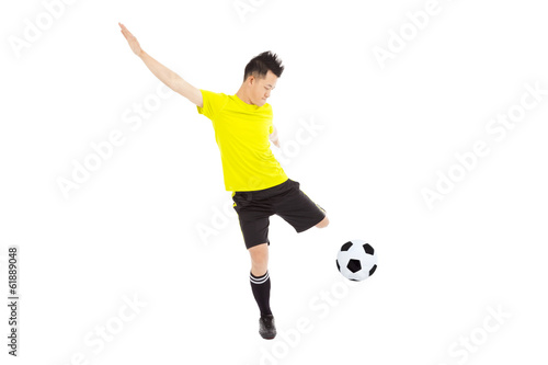 soccer football player young man kicking ball