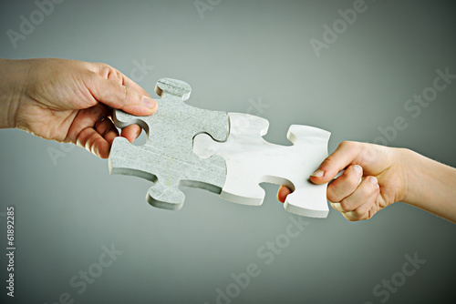 Obraz na plátne Kids connecting the jigsaw puzzle