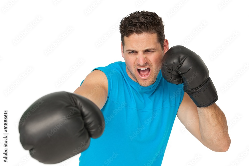 Determined male boxer focused on his training Determined male boxer focused on his training