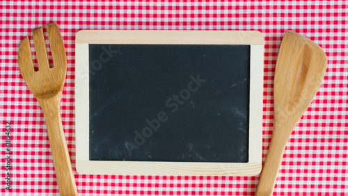 Menu blackboard with wooden spoon