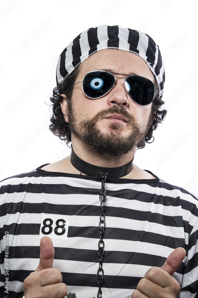 Prison, one caucasian man prisoner criminal with chain ball and Prison, one caucasian man prisoner criminal with chain ball and