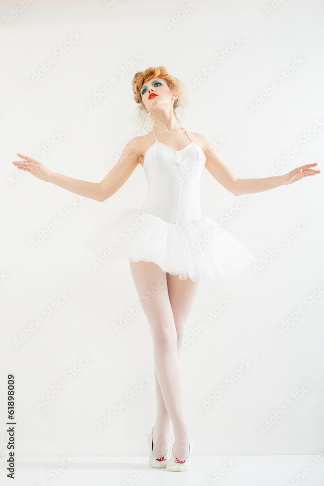 Naklejka premium Beautiful girl dressed as a ballerina. Fashion makeup. Stylish h