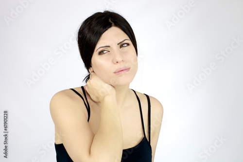Beautiful woman suffering neck pain and problem strong